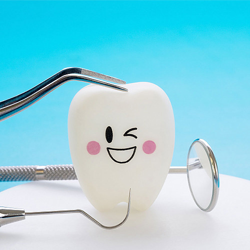 Tandlæge-glad-tand-logo